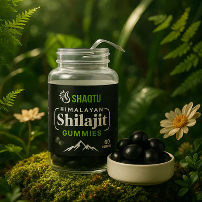 Shilajit Gummies in a jar on a mossy surface, showcasing natural energy and vitality benefits.